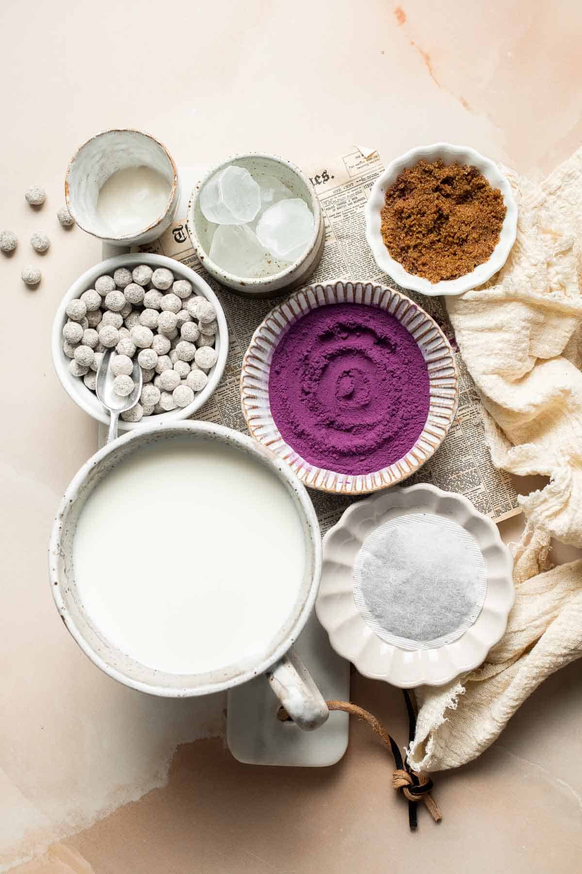 Homemade Taro Bubble Tea is cold and creamy with a nutty vanilla flavor with pops of chewy boba pearls. It's a lot easier to make at home than you think! | aheadofthyme.com
