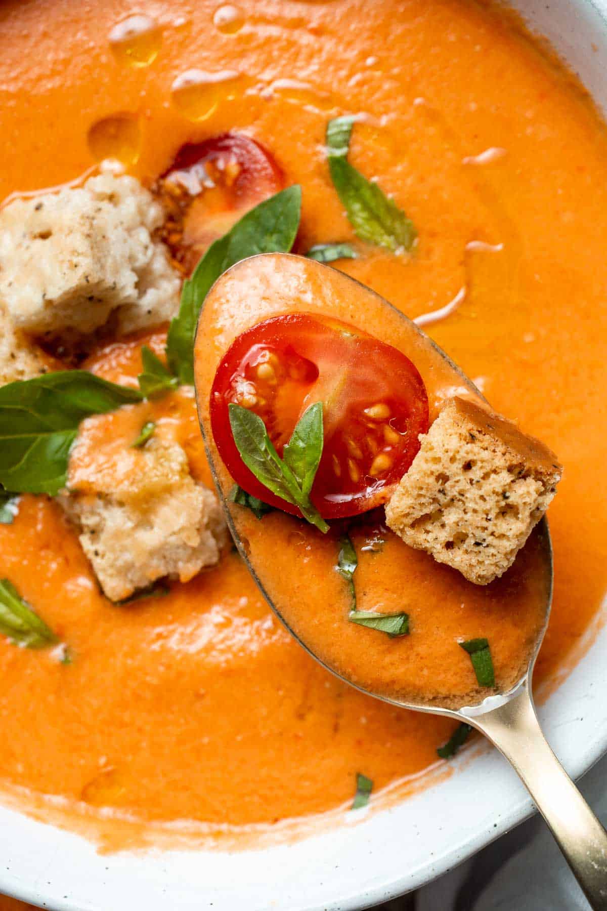 Gazpacho is a refreshing, simple, and delicious chilled soup. This super easy no cook soup is made by blending the summer's freshest veggies. | aheadofthyme.com