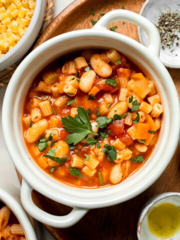 Pasta e Fagioli Soup is a classic Italian soup made with aromatic veggies, creamy white beans, and ditalini pasta, all simmered in a savory tomato broth. | aheadofthyme.com