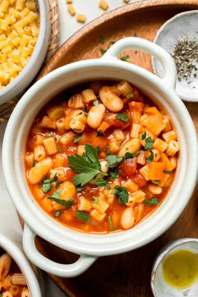Pasta e Fagioli Soup is a classic Italian soup made with aromatic veggies, creamy white beans, and ditalini pasta, all simmered in a savory tomato broth. | aheadofthyme.com
