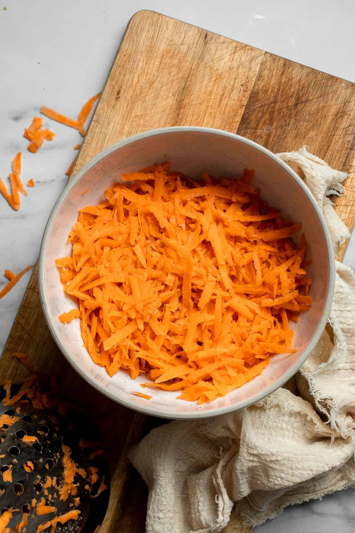 Sweet Potato Fritters are easy to make, flavorful, and delicious. They're pan-fried to perfection with a crisp crust on the outside and a soft bite inside. | aheadofthyme.com
