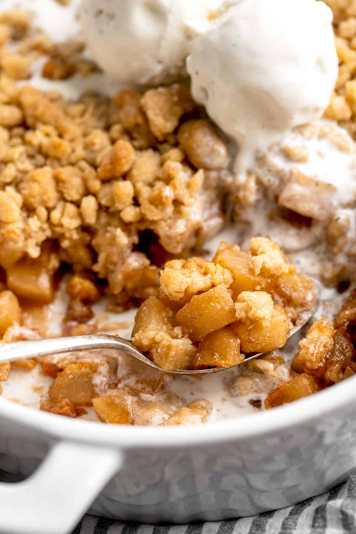 Made with tender apples and topped with a buttery brown sugar crumble, this old-fashioned Apple Crumble is the perfect fall dessert! | aheadofthyme.com