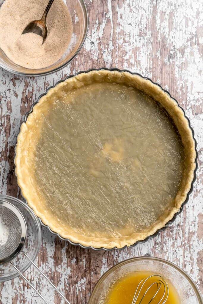 This Apple Tart is a cozy fall dessert made with tart apples nestled in a flaky crust and topped with cinnamon sugar. It's like an apple pie but way better! | aheadofthyme.com