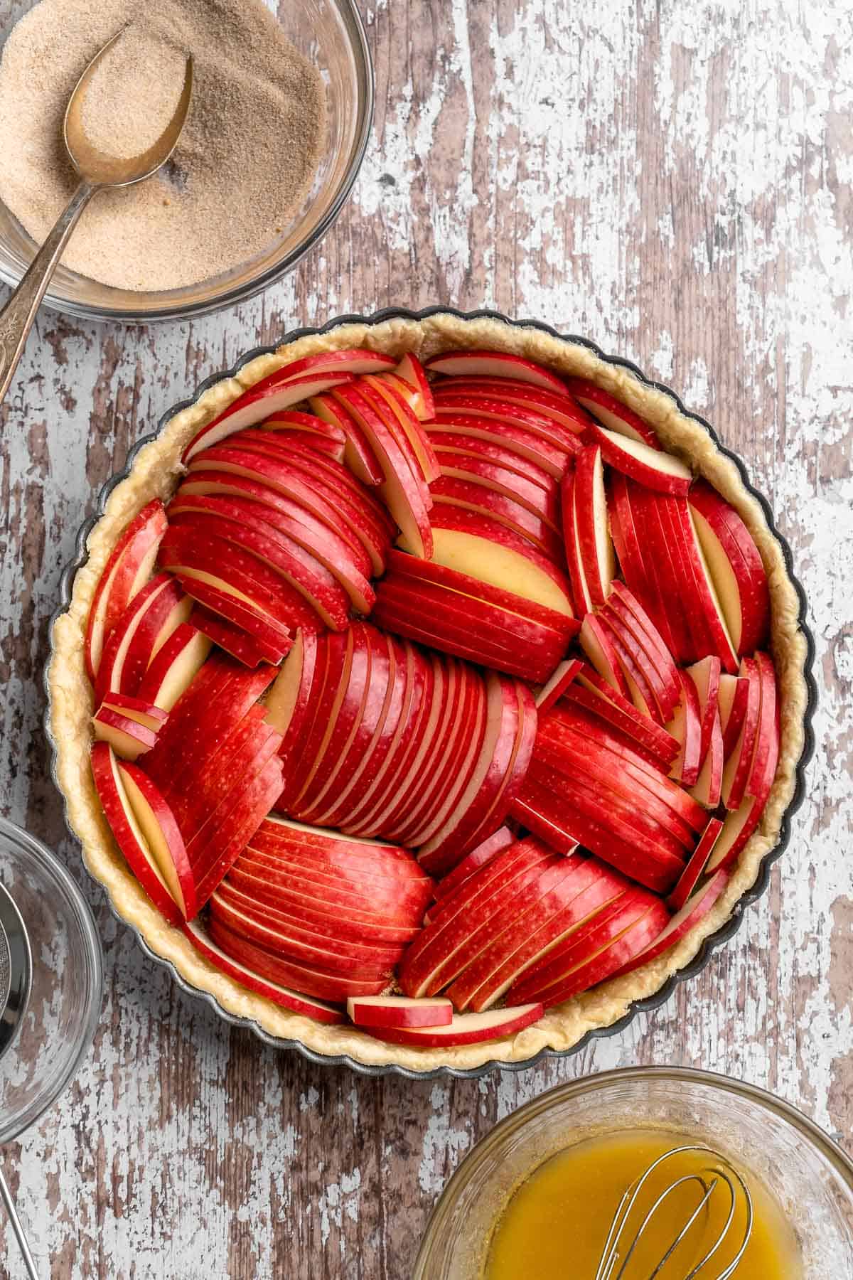 This Apple Tart is a cozy fall dessert made with tart apples nestled in a flaky crust and topped with cinnamon sugar. It's like an apple pie but way better! | aheadofthyme.com
