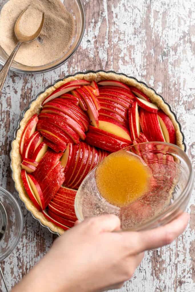 This Apple Tart is a cozy fall dessert made with tart apples nestled in a flaky crust and topped with cinnamon sugar. It's like an apple pie but way better! | aheadofthyme.com