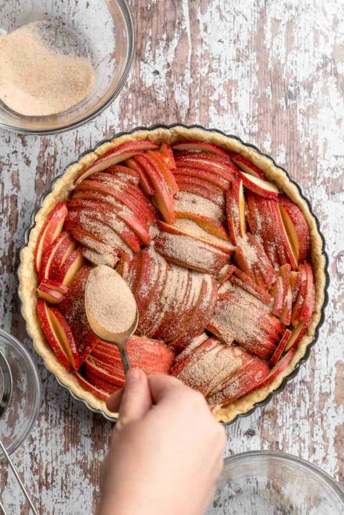 This Apple Tart is a cozy fall dessert made with tart apples nestled in a flaky crust and topped with cinnamon sugar. It's like an apple pie but way better! | aheadofthyme.com