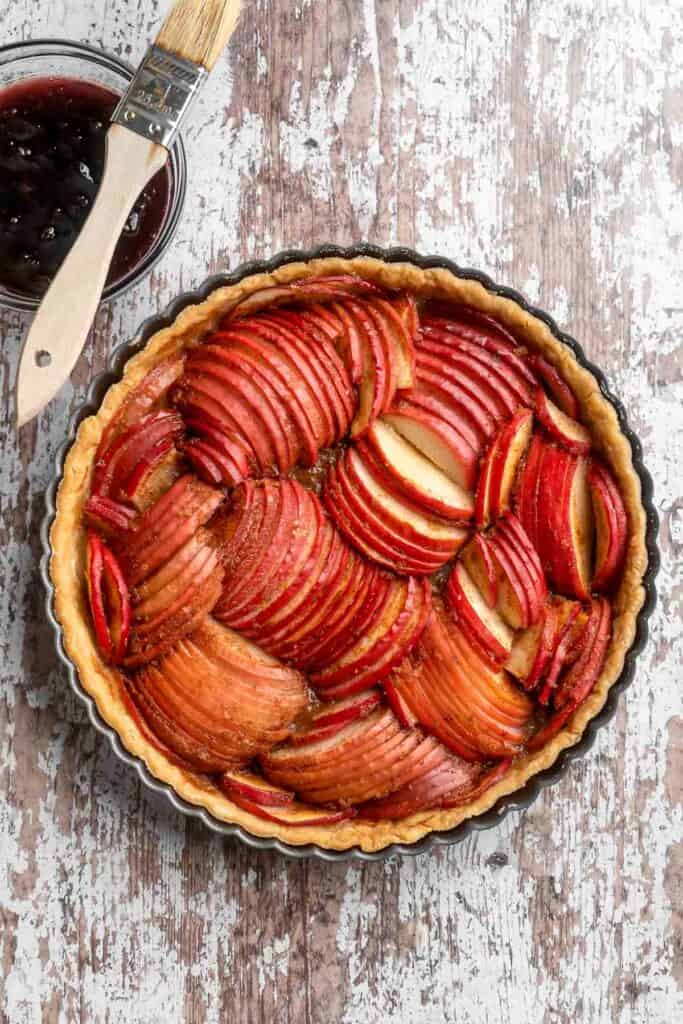 This Apple Tart is a cozy fall dessert made with tart apples nestled in a flaky crust and topped with cinnamon sugar. It's like an apple pie but way better! | aheadofthyme.com