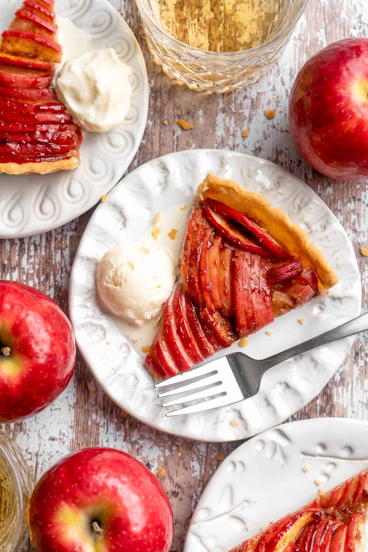 This Apple Tart is a cozy fall dessert made with tart apples nestled in a flaky crust and topped with cinnamon sugar. It's like an apple pie but way better! | aheadofthyme.com