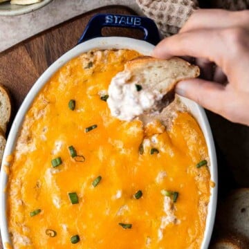 Warm baked Crab Dip is a creamy, cheesy and flavorful appetizer made with tender crab meat, melted cheese, and a creamy base to hold it all together. | aheadofthyme.com