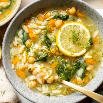 Lemon Chickpea Orzo Soup is a hearty vegan soup loaded with simple ingredients including veggies, chickpeas, and orzo pasta — ready in under 30 minutes. | aheadofthyme.com
