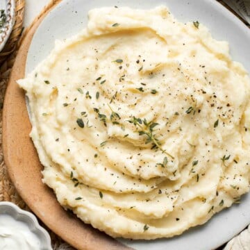 This fluffy, creamy Parsnip Puree looks like mashed potatoes but has a distinctly nutty flavor that sets it apart. It is quick and easy to make too! | aheadofthyme.com