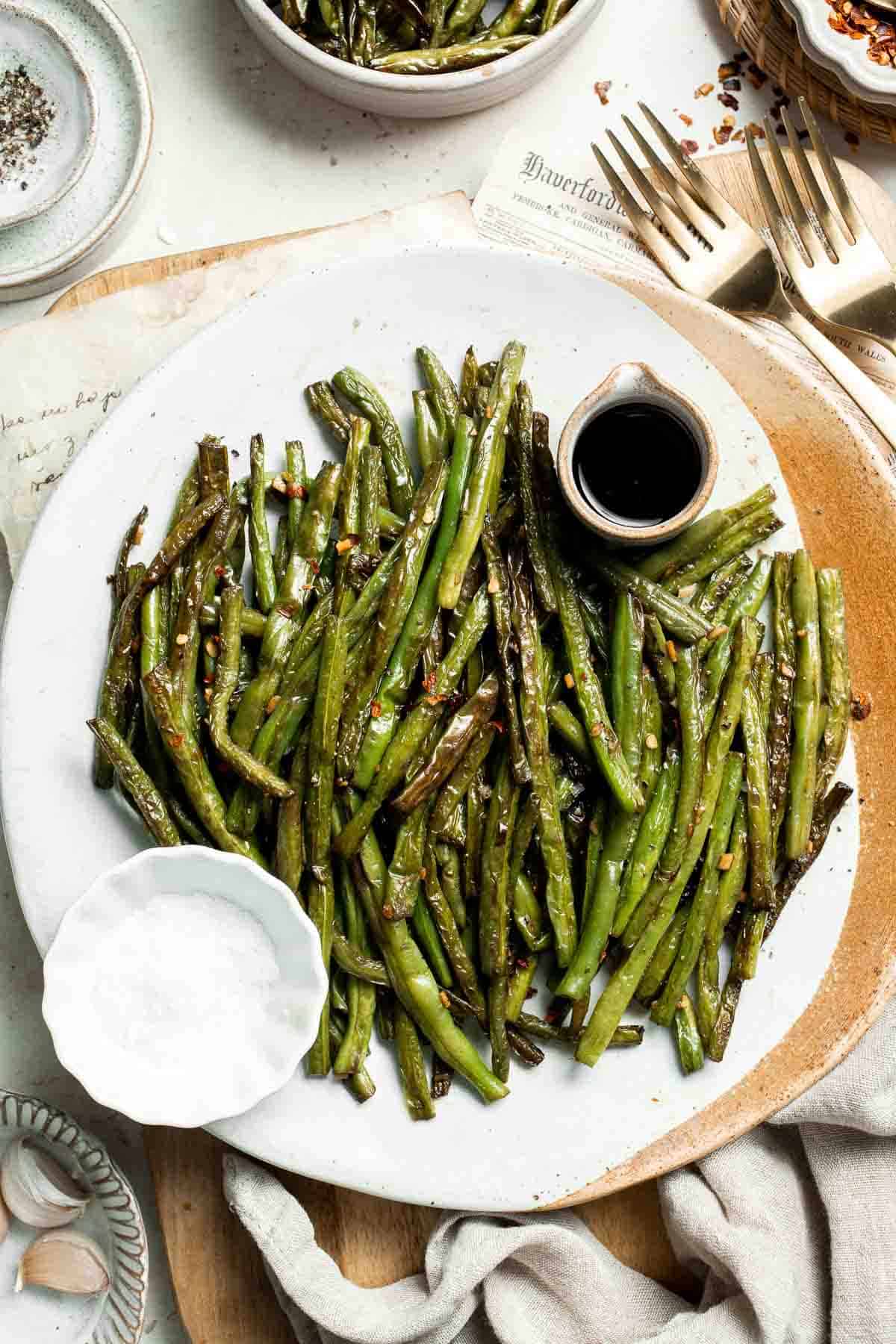 Blistered Green Beans are smoky, garlicky, and peppery. This flavorful side dish is one of the quickest ways to prepare fresh green beans. | aheadofthyme.com
