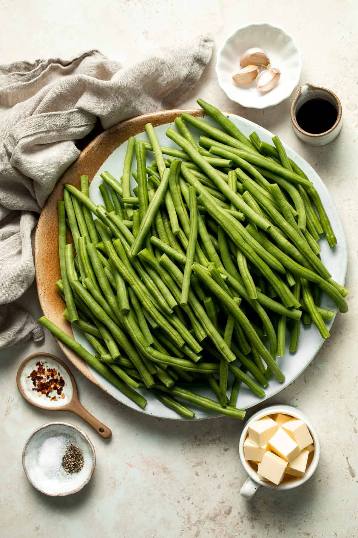 Blistered Green Beans are smoky, garlicky, and peppery. This flavorful side dish is one of the quickest ways to prepare fresh green beans. | aheadofthyme.com