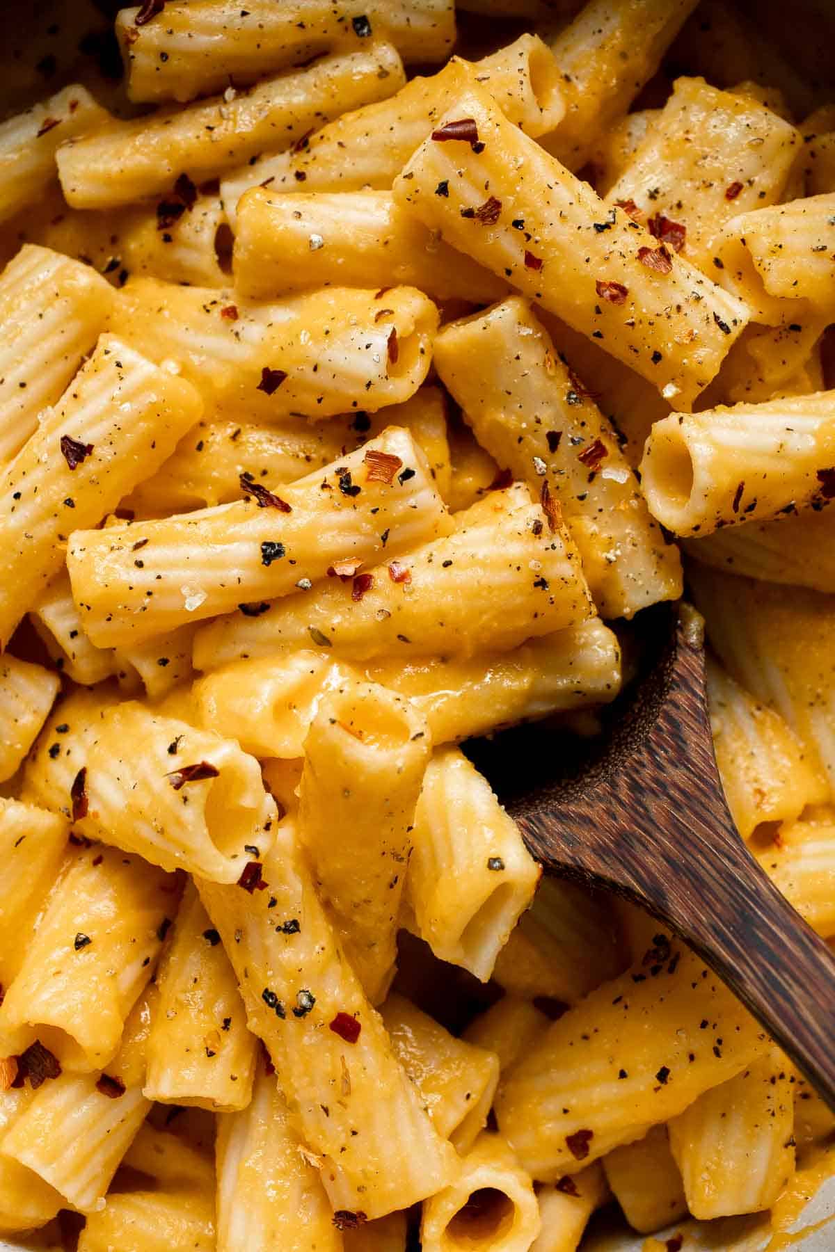 This Creamy Butternut Squash Pasta is cozy, creamy, cheesy fall comfort food. This vegetarian pasta recipe is easy to make too! | aheadofthyme.com