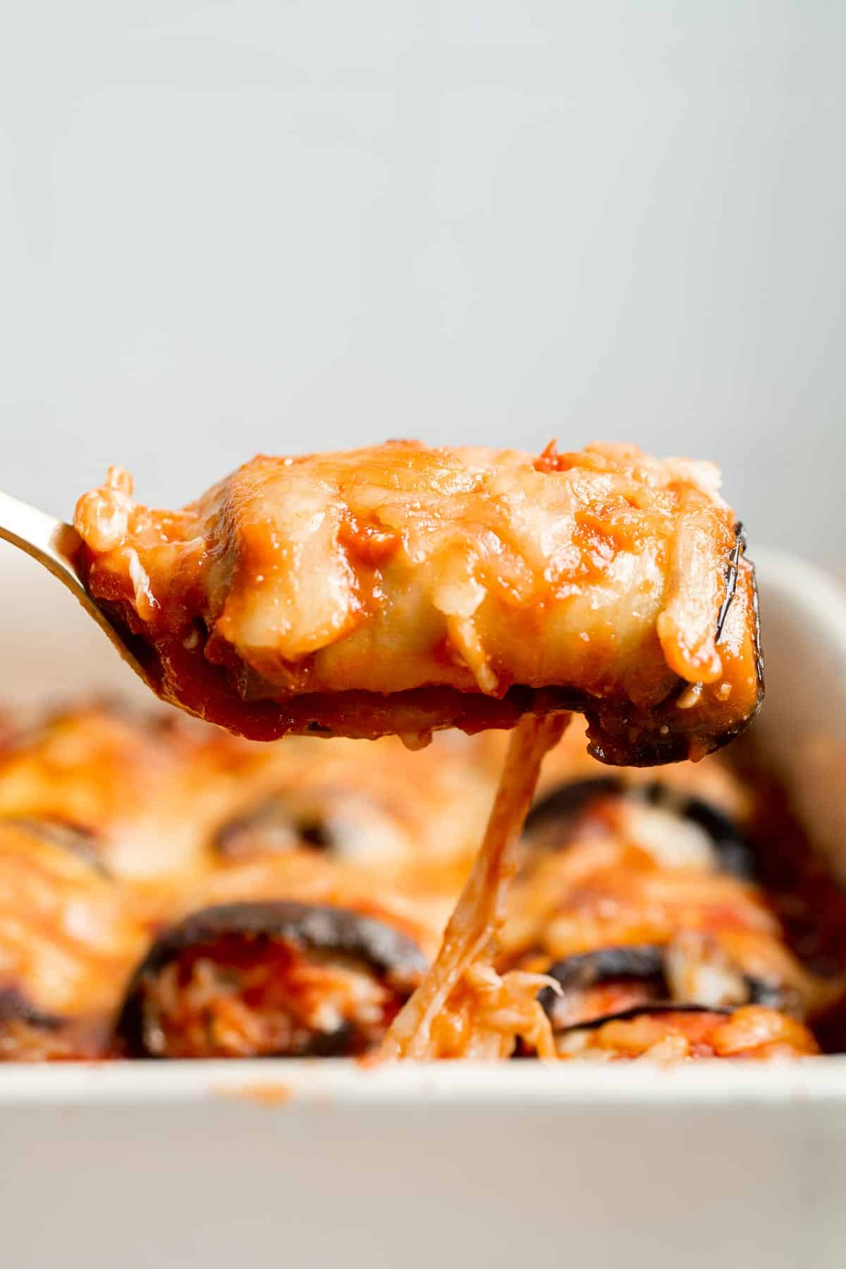 Eggplant Rollatini features roasted eggplant stuffed with creamy ricotta, baked in marinara, and topped with cheese — the best vegetarian comfort food! | aheadofthyme.com