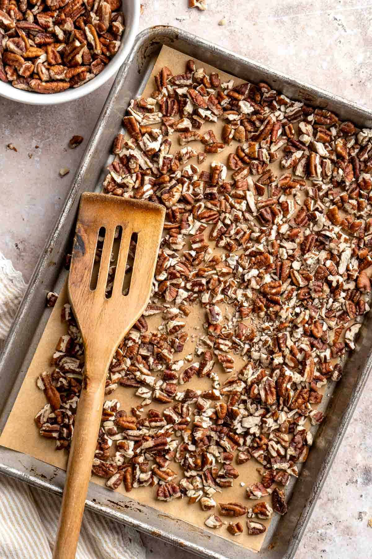 Pecan Pie Cookies have a buttery, chewy cookie base with a dollop of homemade pecan pie filling in the center of each one. They taste just like the classic! | aheadofthyme.com