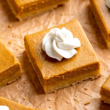 With a buttery shortbread crust and velvety pumpkin filling, these Pumpkin Pie Bars make it easy to traditional pumpkin pie in handheld form! | aheadofthyme.com
