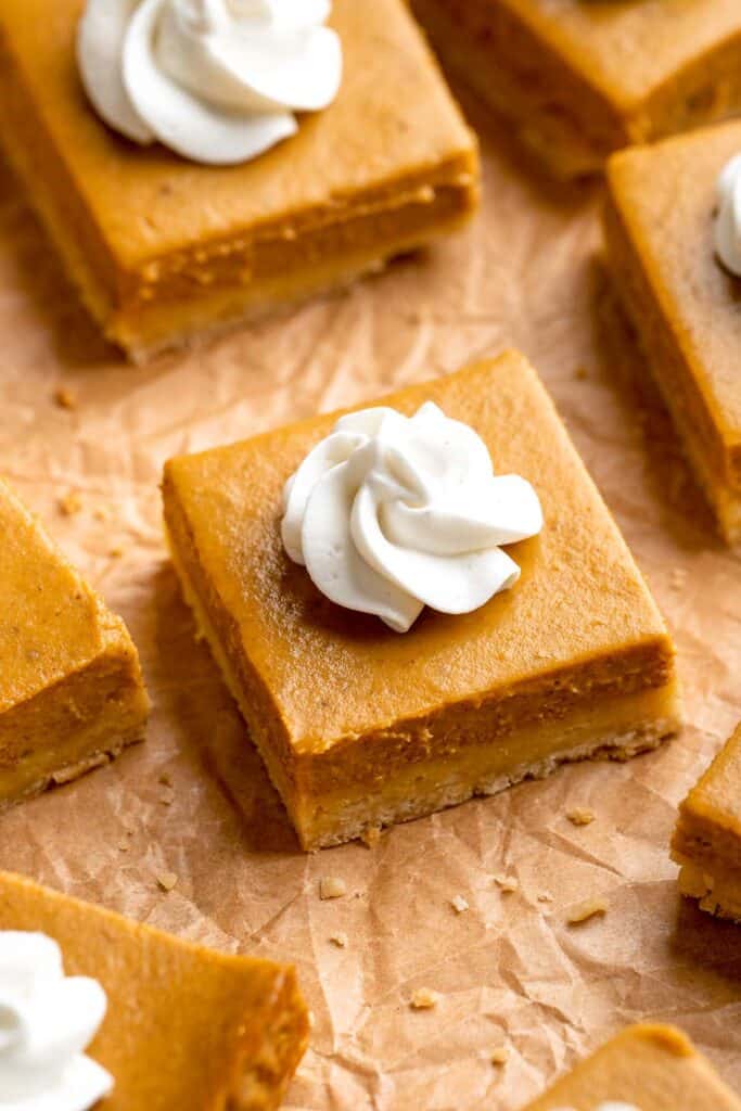 With a buttery shortbread crust and velvety pumpkin filling, these Pumpkin Pie Bars make it easy to traditional pumpkin pie in handheld form! | aheadofthyme.com