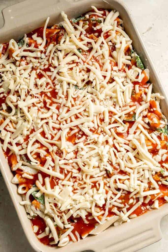 Spinach and Ricotta Pasta Bake is the ultimate cozy comfort meal, packed with creamy ricotta and tender spinach, tossed in marinara, and baked until bubbly. | aheadofthyme.com