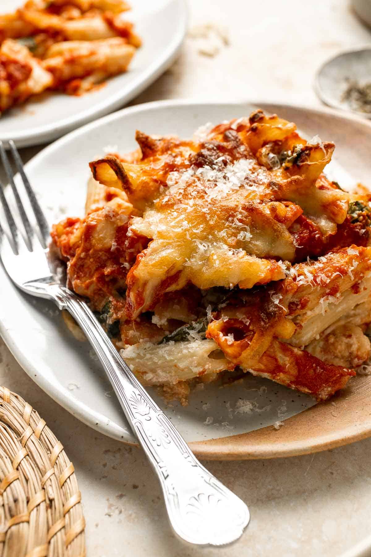 Spinach and Ricotta Pasta Bake is the ultimate cozy comfort meal, packed with creamy ricotta and tender spinach, tossed in marinara, and baked until bubbly. | aheadofthyme.com