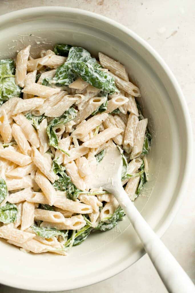 Spinach and Ricotta Pasta Bake is the ultimate cozy comfort meal, packed with creamy ricotta and tender spinach, tossed in marinara, and baked until bubbly. | aheadofthyme.com