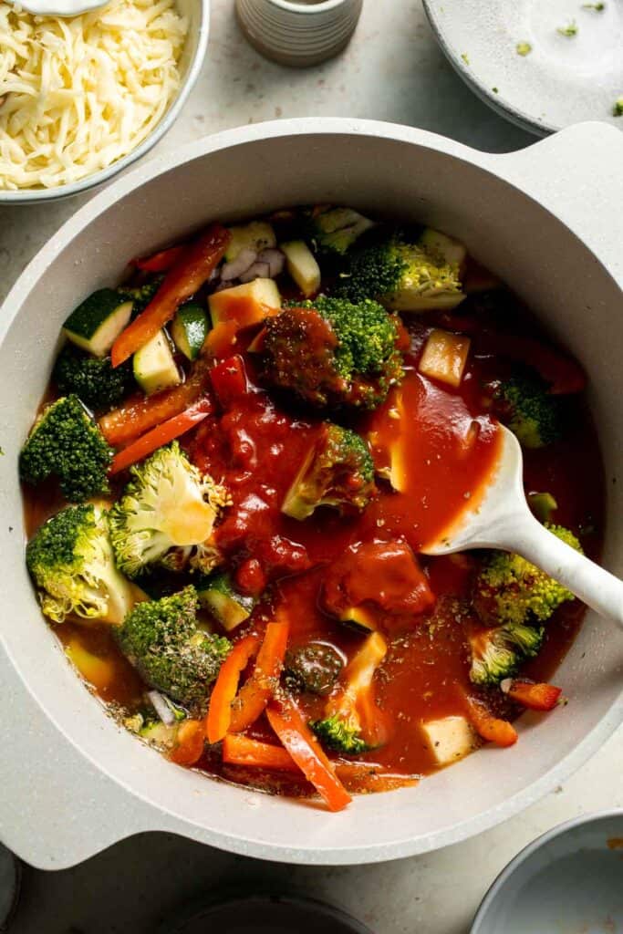 Feed the whole family on busy weeknights with this hearty Vegetable Pasta Bake that is easy to make, packed with veggies, and loaded with flavor! | aheadofthyme.com