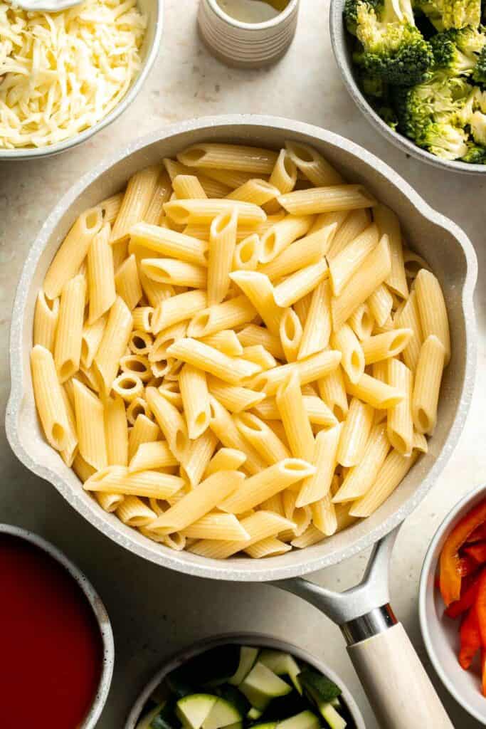 Feed the whole family on busy weeknights with this hearty Vegetable Pasta Bake that is easy to make, packed with veggies, and loaded with flavor! | aheadofthyme.com