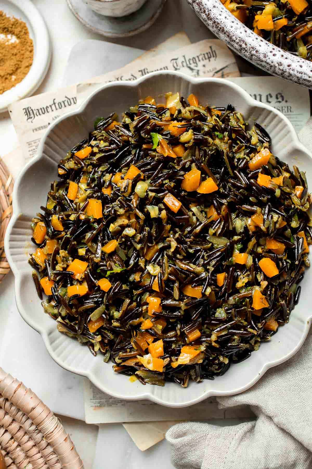 Wild Rice Pilaf is a wholesome, nutritious side dish that pairs the naturally nutty flavor of wild rice with vegetables, spices, and fresh herbs. | aheadofthyme.com