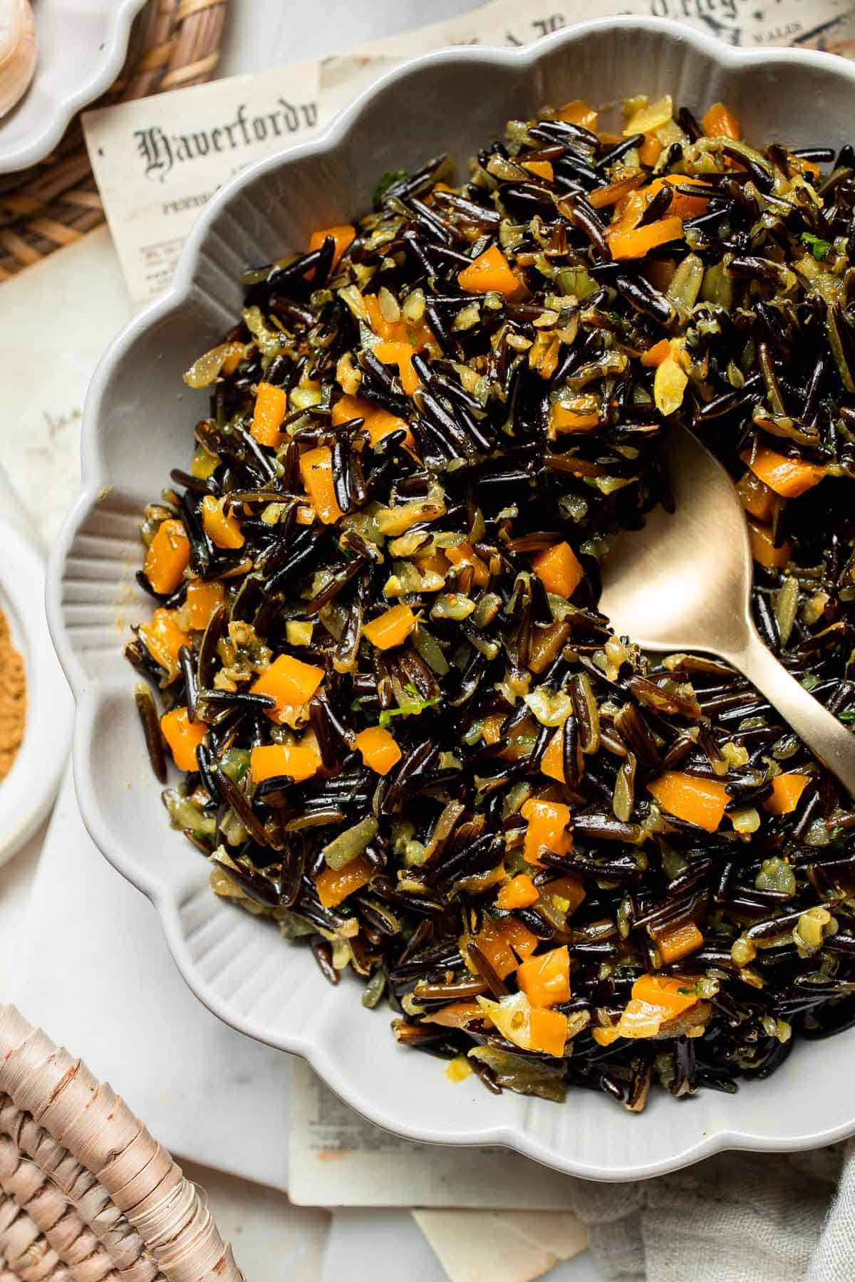 Wild Rice Pilaf is a wholesome, nutritious side dish that pairs the naturally nutty flavor of wild rice with vegetables, spices, and fresh herbs. | aheadofthyme.com