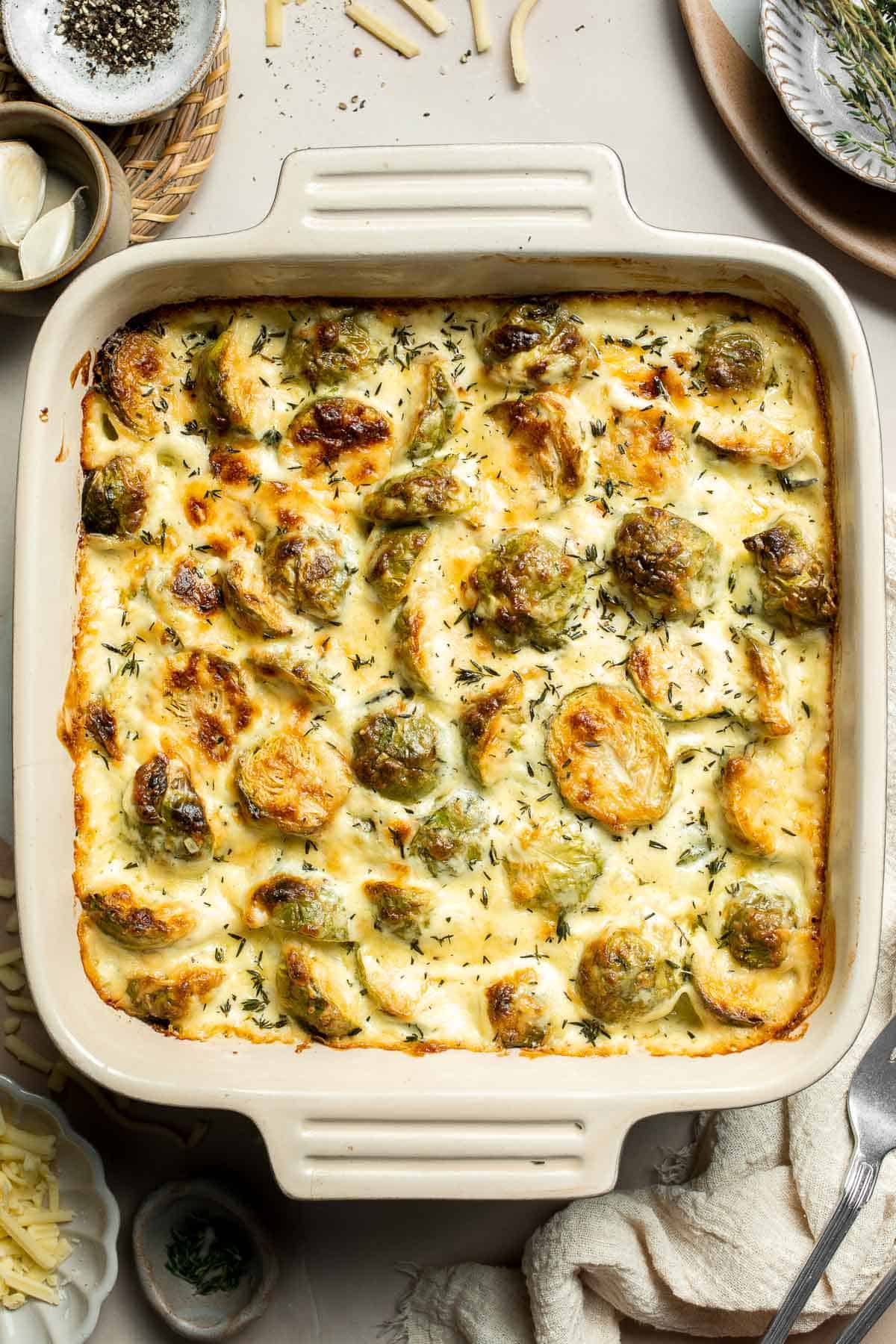 Made with tender, roasted Brussels sprouts baked in a rich, creamy cheese sauce, this Brussels Sprouts Gratin is the ultimate fall comfort food. | aheadofthyme.com
