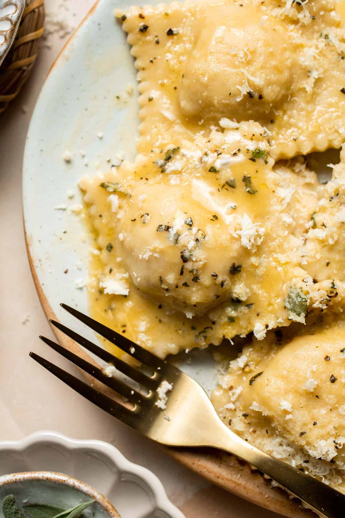 Homemade Butternut Squash Ravioli is a vegetarian dinner filled with roasted butternut squash and served with a nutty brown butter sauce with crispy sage. | aheadofthyme.com
