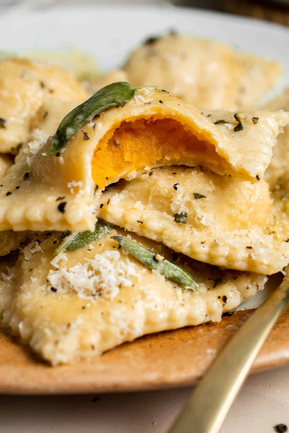 Homemade Butternut Squash Ravioli is a vegetarian dinner filled with roasted butternut squash and served with a nutty brown butter sauce with crispy sage. | aheadofthyme.com