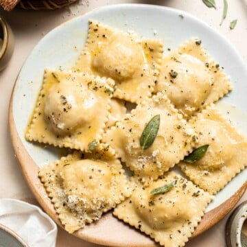 Homemade Butternut Squash Ravioli is a vegetarian dinner filled with roasted butternut squash and served with a nutty brown butter sauce with crispy sage. | aheadofthyme.com