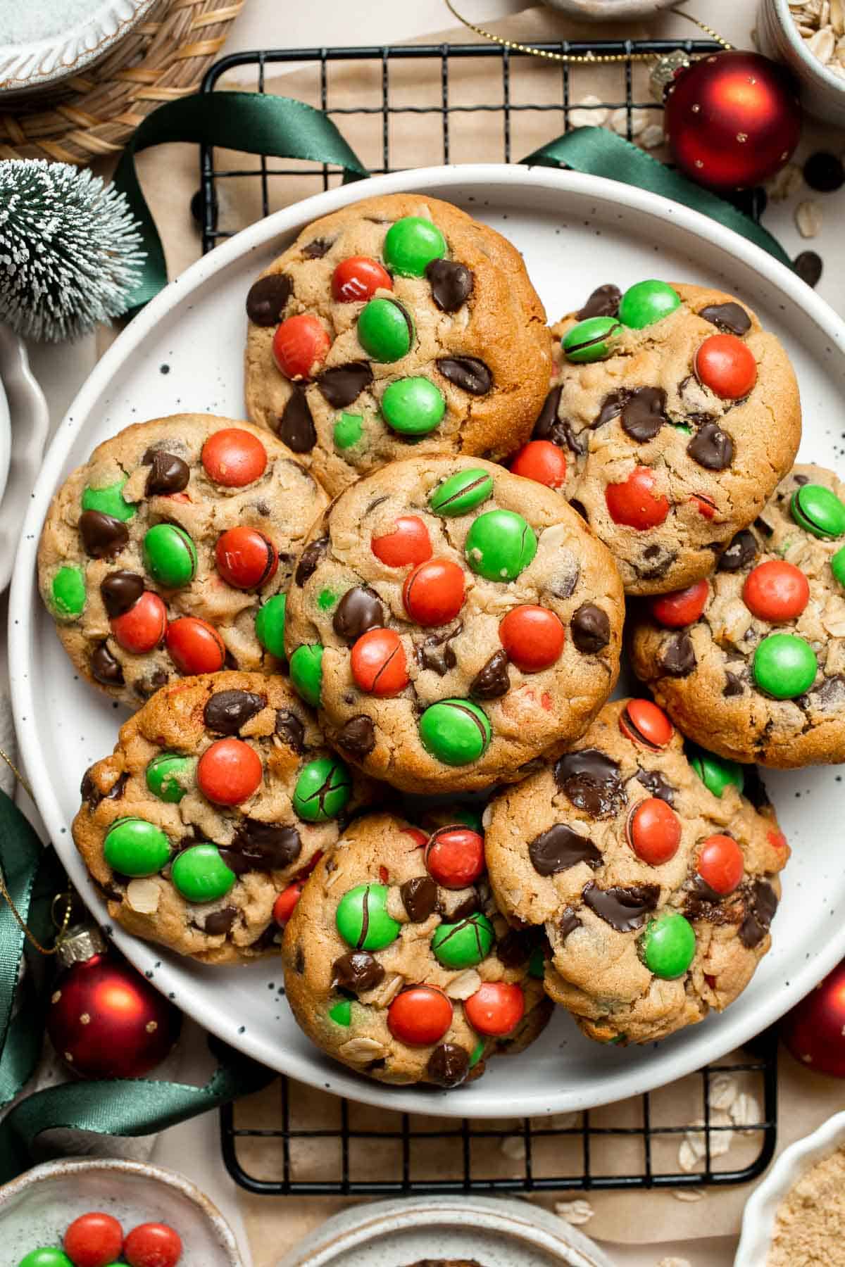 Christmas Monster Cookies are soft, chewy, festive and packed with holiday cheer! Loaded with oats, peanut butter, chocolate chips, and red and green MnM’s. | aheadofthyme.com