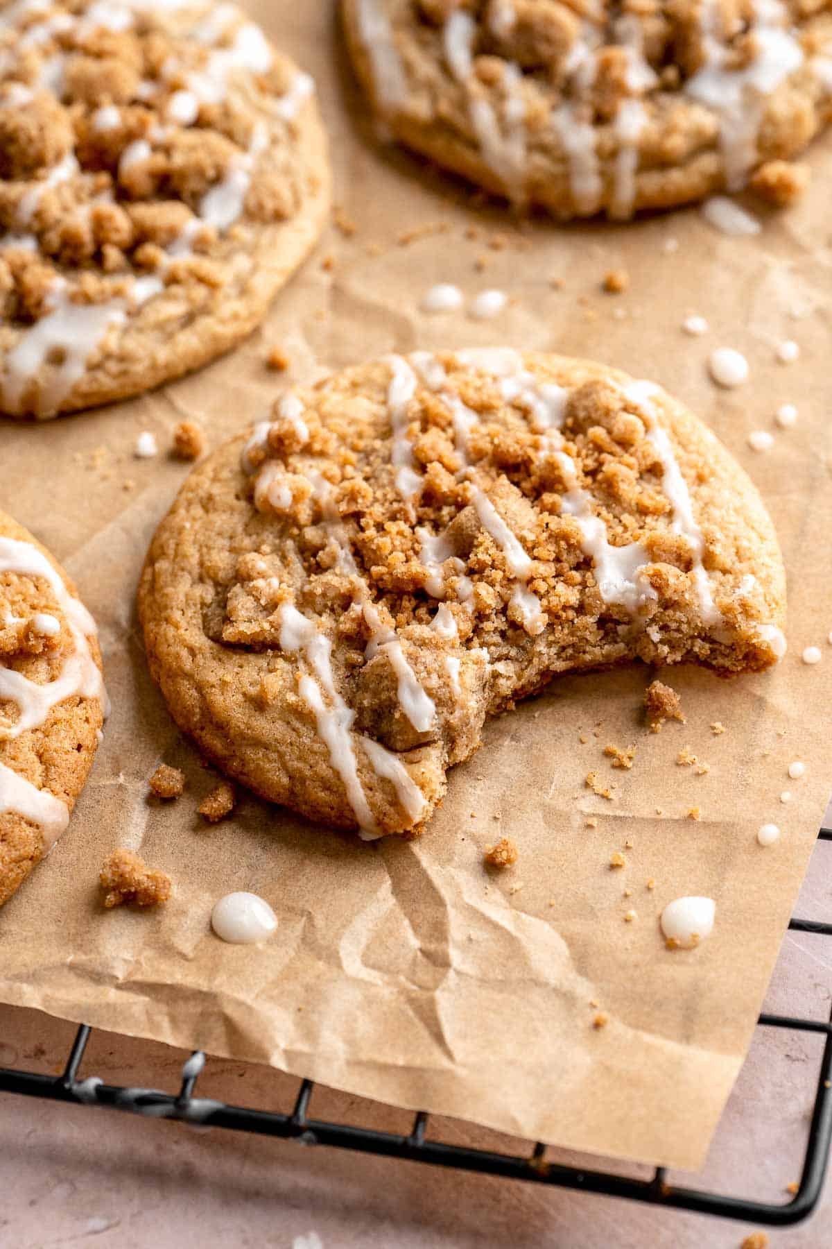 Coffee Cake Cookies combine a soft, cinnamon cookie base with a crumbly streusel topping and a drizzle of sweet glaze. A classic dessert in cookie form! | aheadofthyme.com