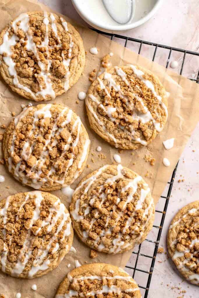 Coffee Cake Cookies combine a soft, cinnamon cookie base with a crumbly streusel topping and a drizzle of sweet glaze. A classic dessert in cookie form! | aheadofthyme.com