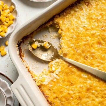 Creamy Corn Pudding transforms simple pantry staples into a luscious pudding packed with flavor. Serve this traditional Southern side dish for Thanksgiving. | aheadofthyme.com