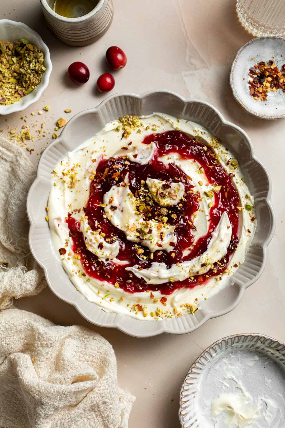 This Cranberry Whipped Feta Dip is a festive, creamy appetizer that comes together in minutes with just a handful of simple ingredients. | aheadofthyme.com