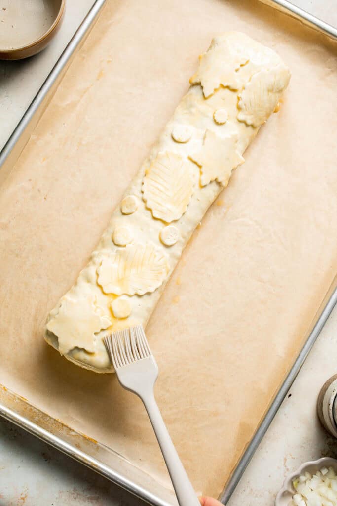 Mushroom Wellington is a vegetarian entree filled with mushrooms, vegetables, fresh herbs, and pecans, wrapped in flaky puff pastry and baked until golden. | aheadofthyme.com