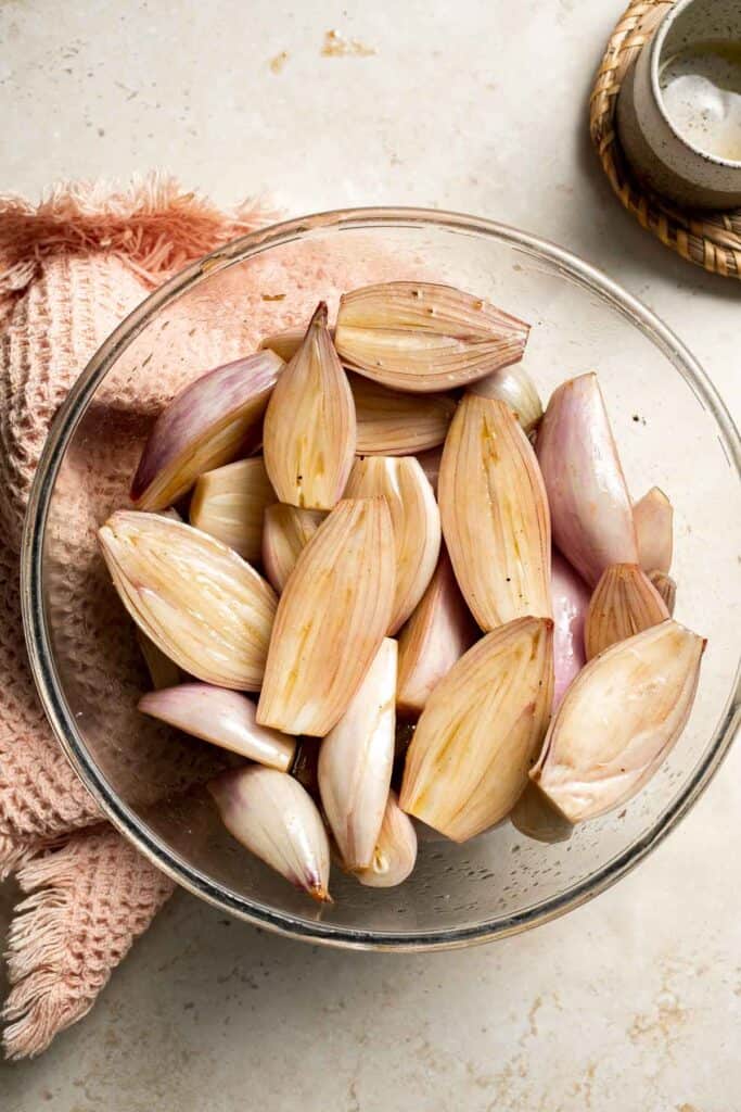 Roasted Shallots are a rich, caramelized side dish with a hint of sweetness and a kick from tangy balsamic vinegar. Ready in just 30 minutes! | aheadofthyme.com