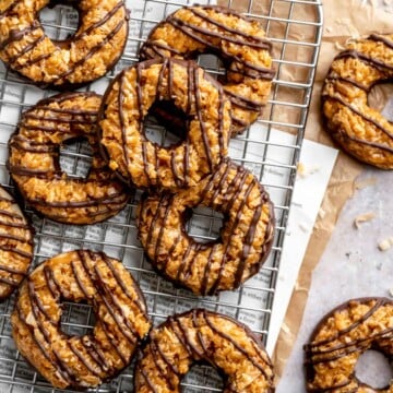 Homemade Samoas Cookies (copycat Girl Scout cookies) have a buttery shortbread base, gooey coconut caramel topping, and melted chocolate drizzle. | aheadofthyme.com