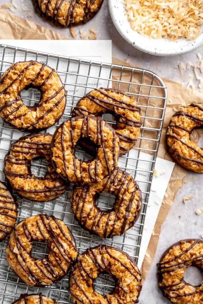Homemade Samoas Cookies (copycat Girl Scout cookies) have a buttery shortbread base, gooey coconut caramel topping, and melted chocolate drizzle. | aheadofthyme.com