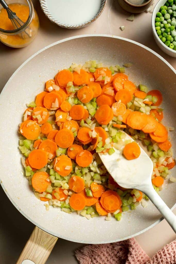 Vegetarian Pot Pie is truly the ultimate comfort food. The creamy filling is loaded with tender veggies, all wrapped in a buttery, flaky puff pastry crust. | aheadofthyme.com