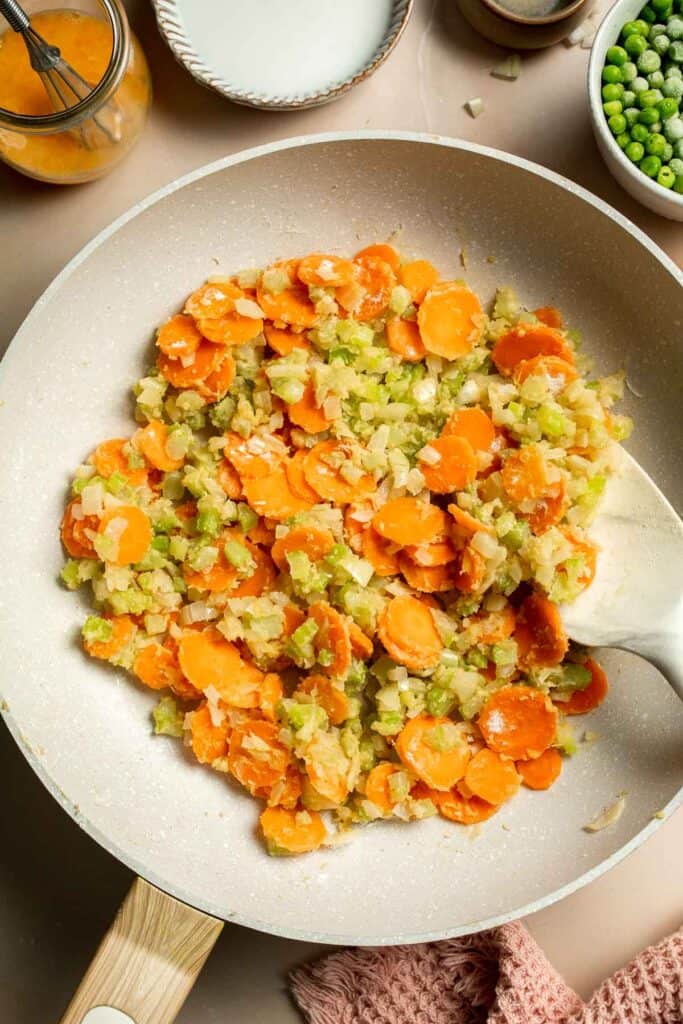 Vegetarian Pot Pie is truly the ultimate comfort food. The creamy filling is loaded with tender veggies, all wrapped in a buttery, flaky puff pastry crust. | aheadofthyme.com