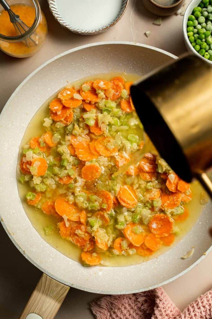 Vegetarian Pot Pie is truly the ultimate comfort food. The creamy filling is loaded with tender veggies, all wrapped in a buttery, flaky puff pastry crust. | aheadofthyme.com