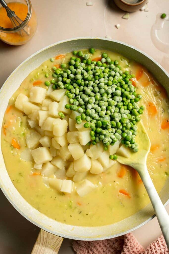 Vegetarian Pot Pie is truly the ultimate comfort food. The creamy filling is loaded with tender veggies, all wrapped in a buttery, flaky puff pastry crust. | aheadofthyme.com