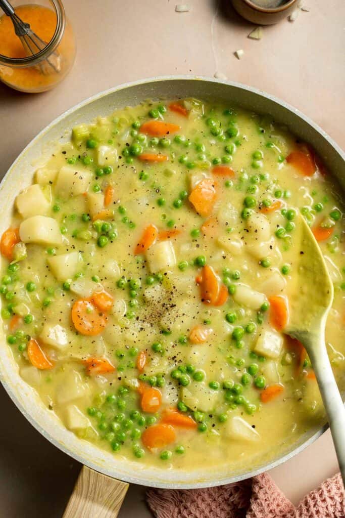 Vegetarian Pot Pie is truly the ultimate comfort food. The creamy filling is loaded with tender veggies, all wrapped in a buttery, flaky puff pastry crust. | aheadofthyme.com
