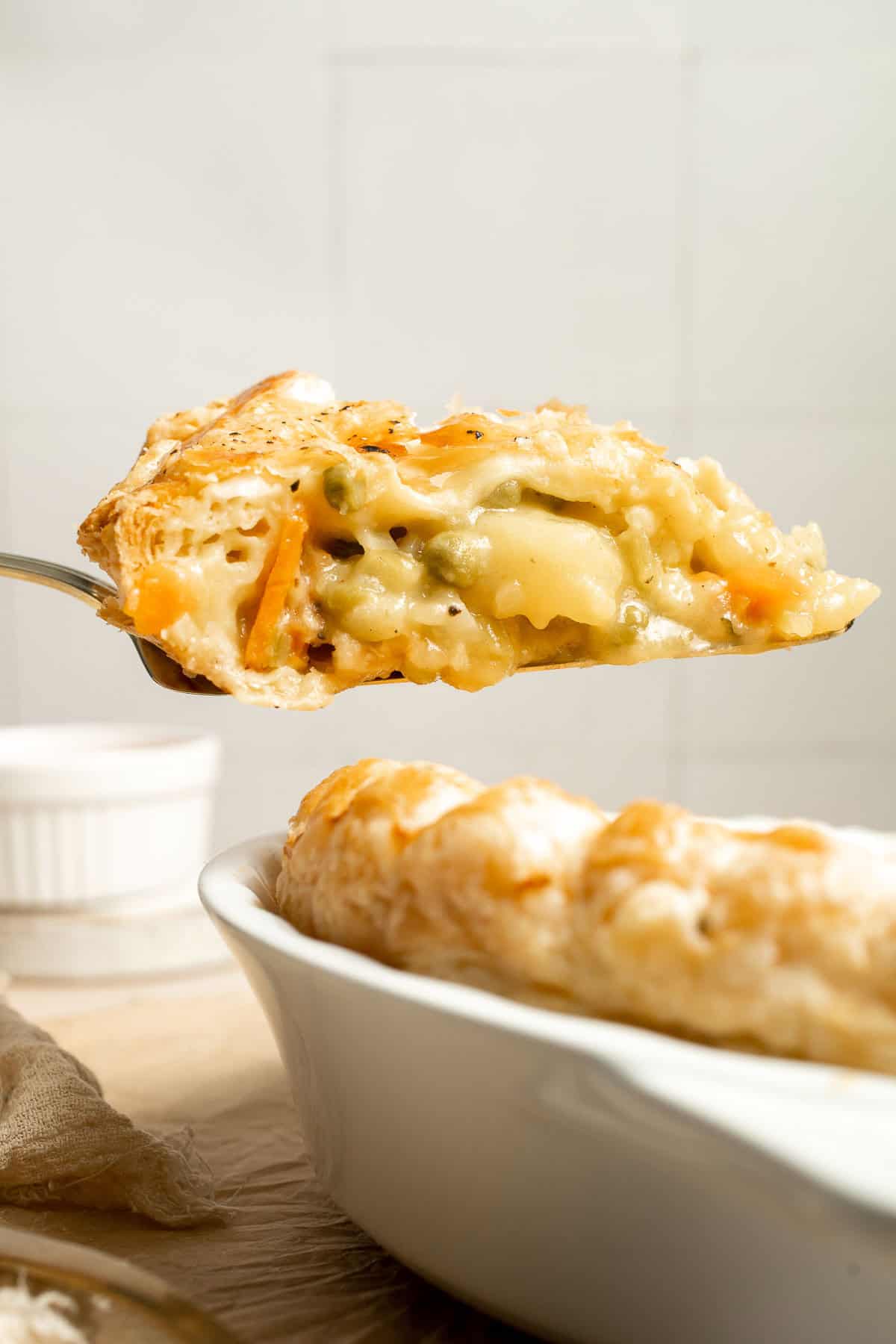 Vegetarian Pot Pie is truly the ultimate comfort food. The creamy filling is loaded with tender veggies, all wrapped in a buttery, flaky puff pastry crust. | aheadofthyme.com