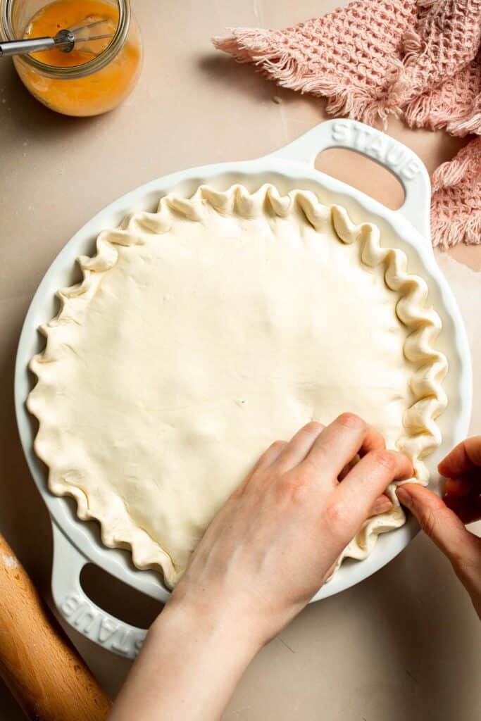 Vegetarian Pot Pie is truly the ultimate comfort food. The creamy filling is loaded with tender veggies, all wrapped in a buttery, flaky puff pastry crust. | aheadofthyme.com