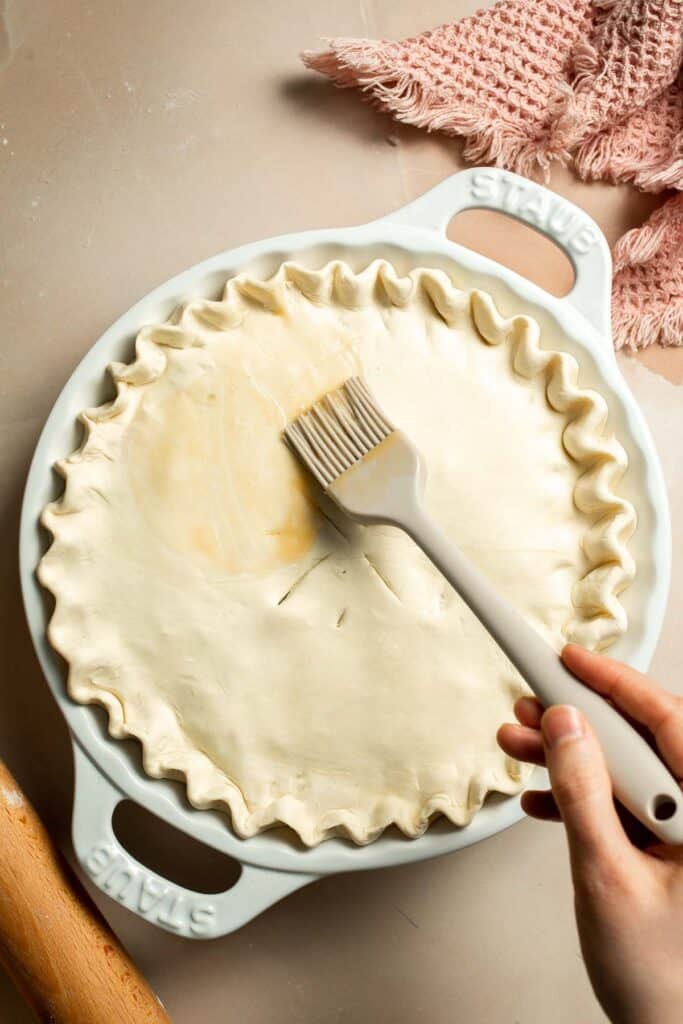 Vegetarian Pot Pie is truly the ultimate comfort food. The creamy filling is loaded with tender veggies, all wrapped in a buttery, flaky puff pastry crust. | aheadofthyme.com